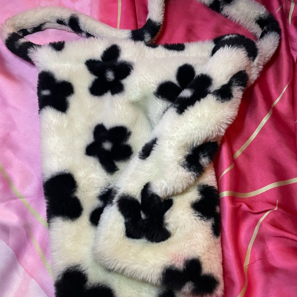 cute small fluffy bag and fluffy white heart shapes earplugs